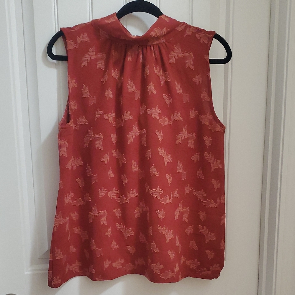 Easel Sleeveless Mock Neck Blouse in Rust with Leaf Pattern